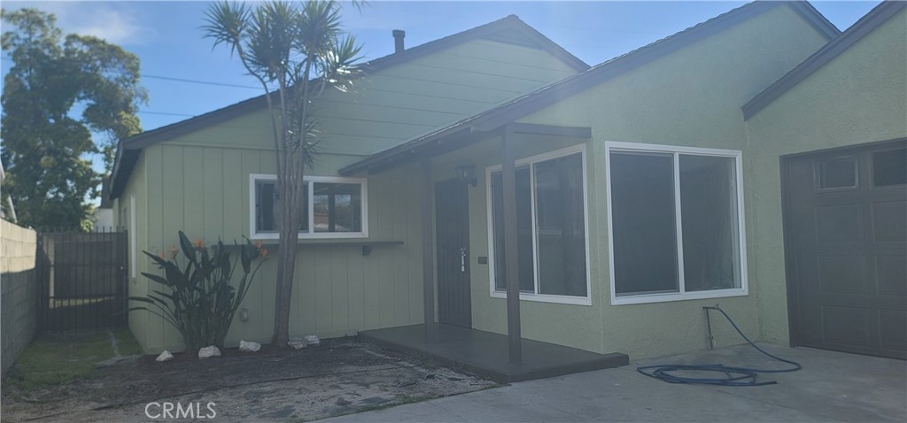 720 West 137th Street Compton, CA 90222 - Photo 2 of 5 a front view of a house