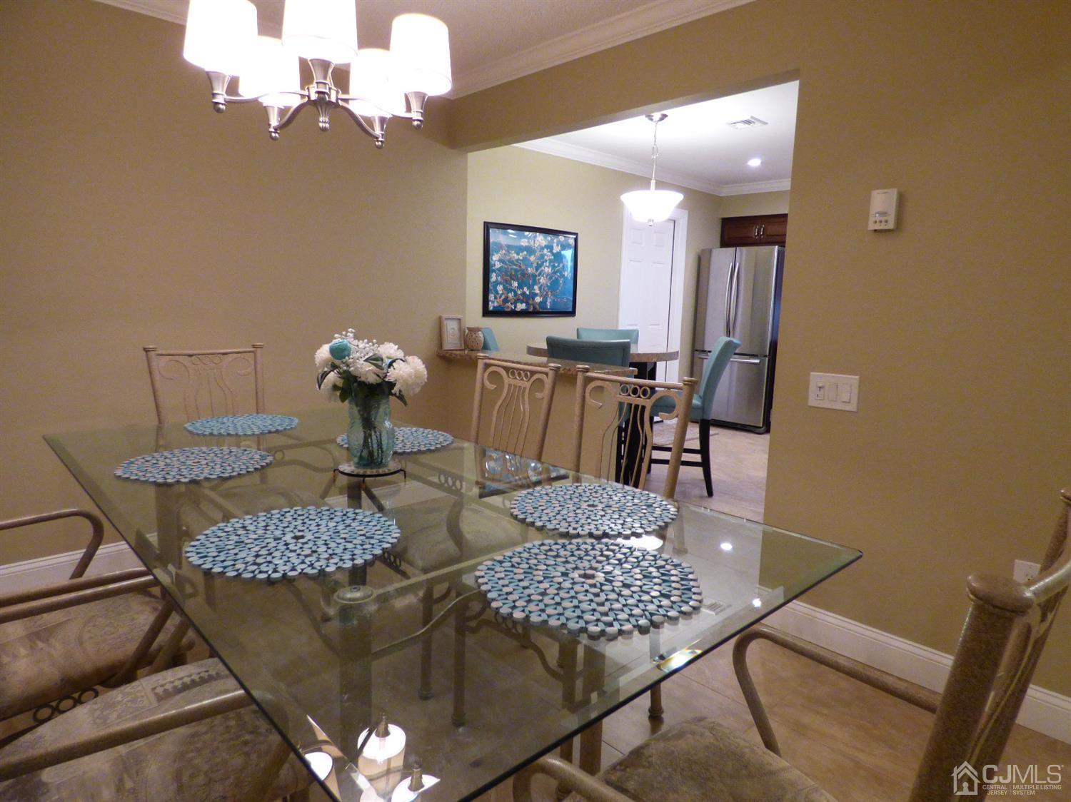 797B Sparta Road, Unit 797A Monroe Township, NJ 08831 - Photo 11 of 25 a view of a dining room with furniture