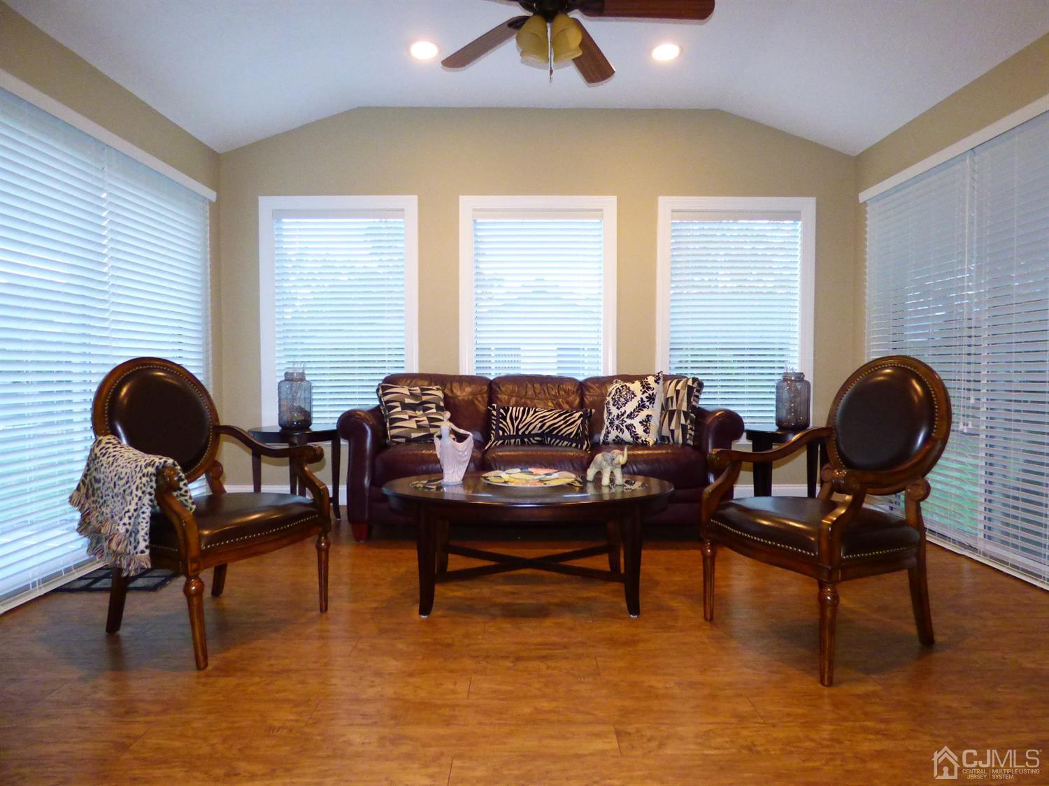 797B Sparta Road, Unit 797A Monroe Township, NJ 08831 - Photo 17 of 25 a view of a workspace room with furniture and wooden floor
