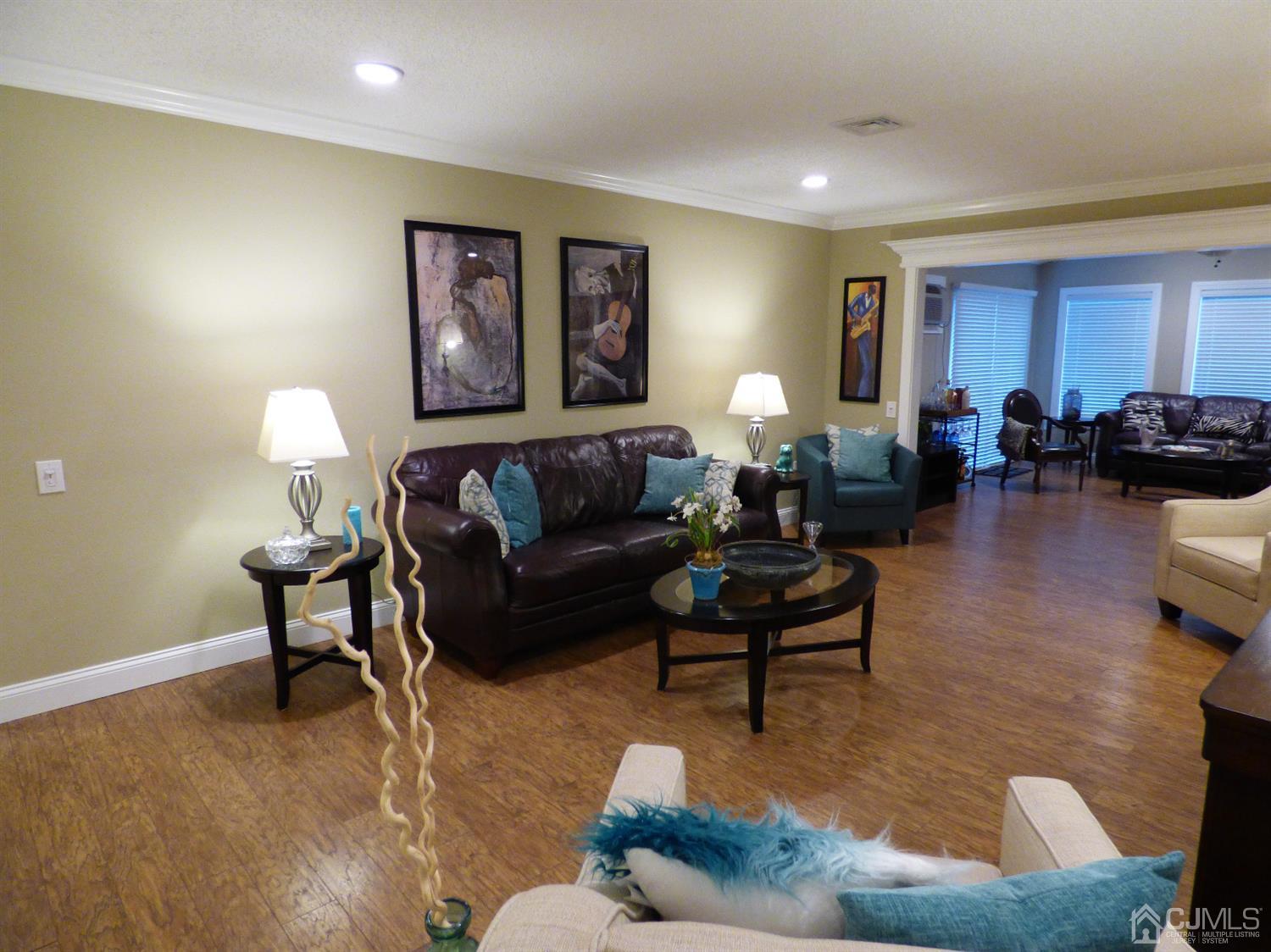 797B Sparta Road, Unit 797A Monroe Township, NJ 08831 - Photo 7 of 25 a living room with furniture wooden floor and window