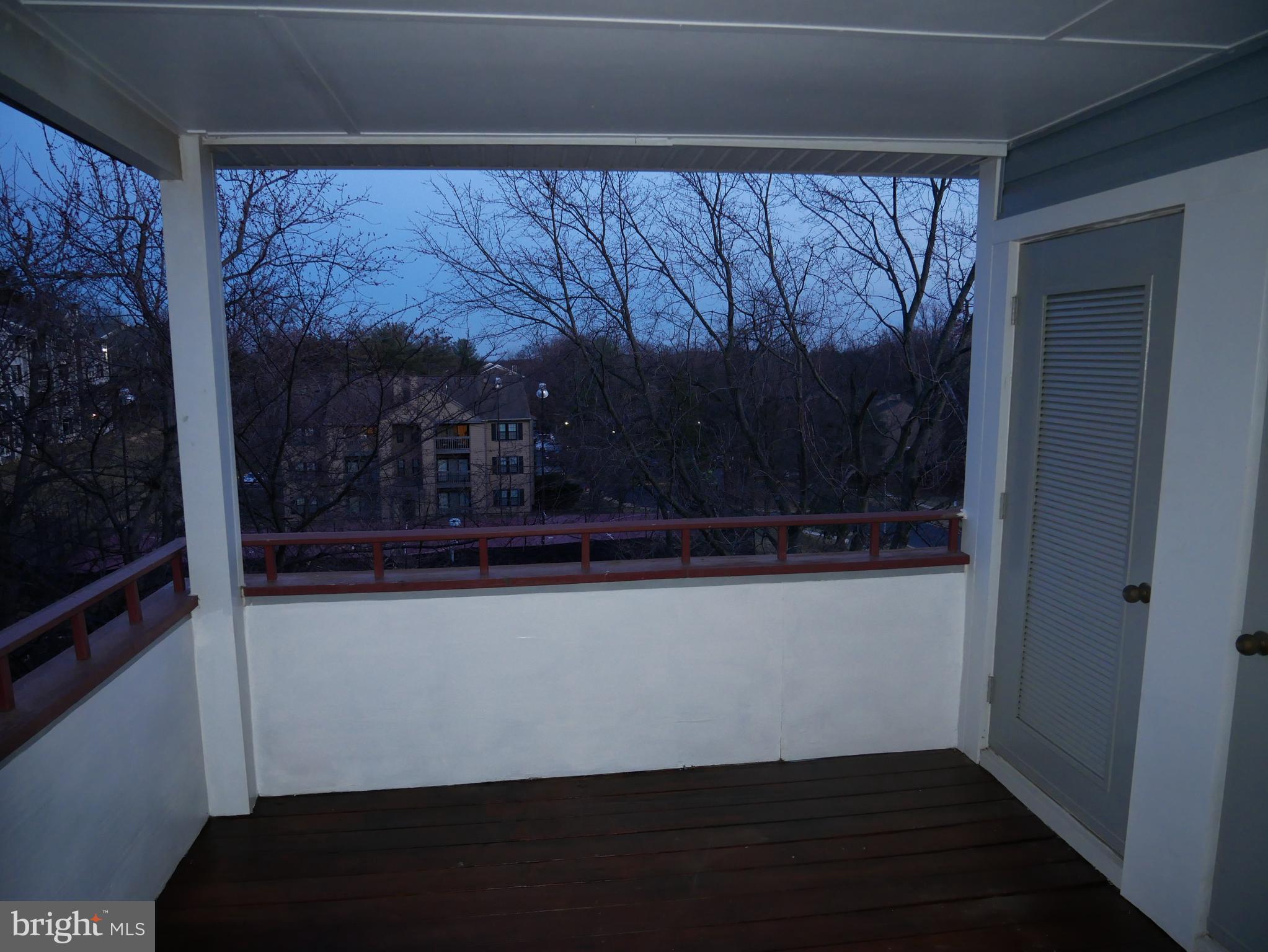 13611 Sir Thomas Way, Unit 1B33 Silver Spring, MD 20904 - Photo 24 of 26 Newly Treated Deck + Fresh Paint