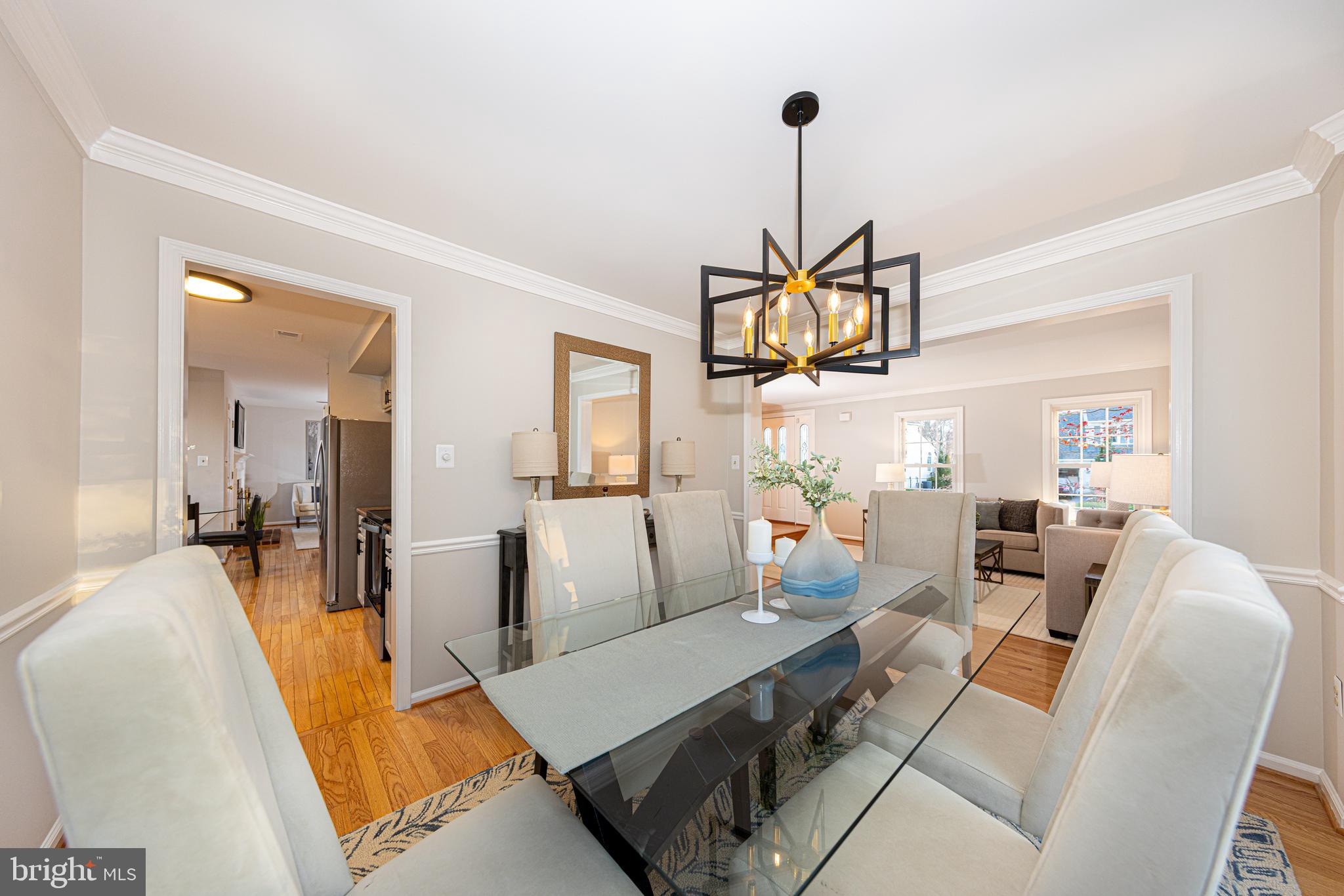 9596 Oakington Drive Fairfax Station, VA 22039 - Photo 11 of 52 a living room with furniture and a wooden floor