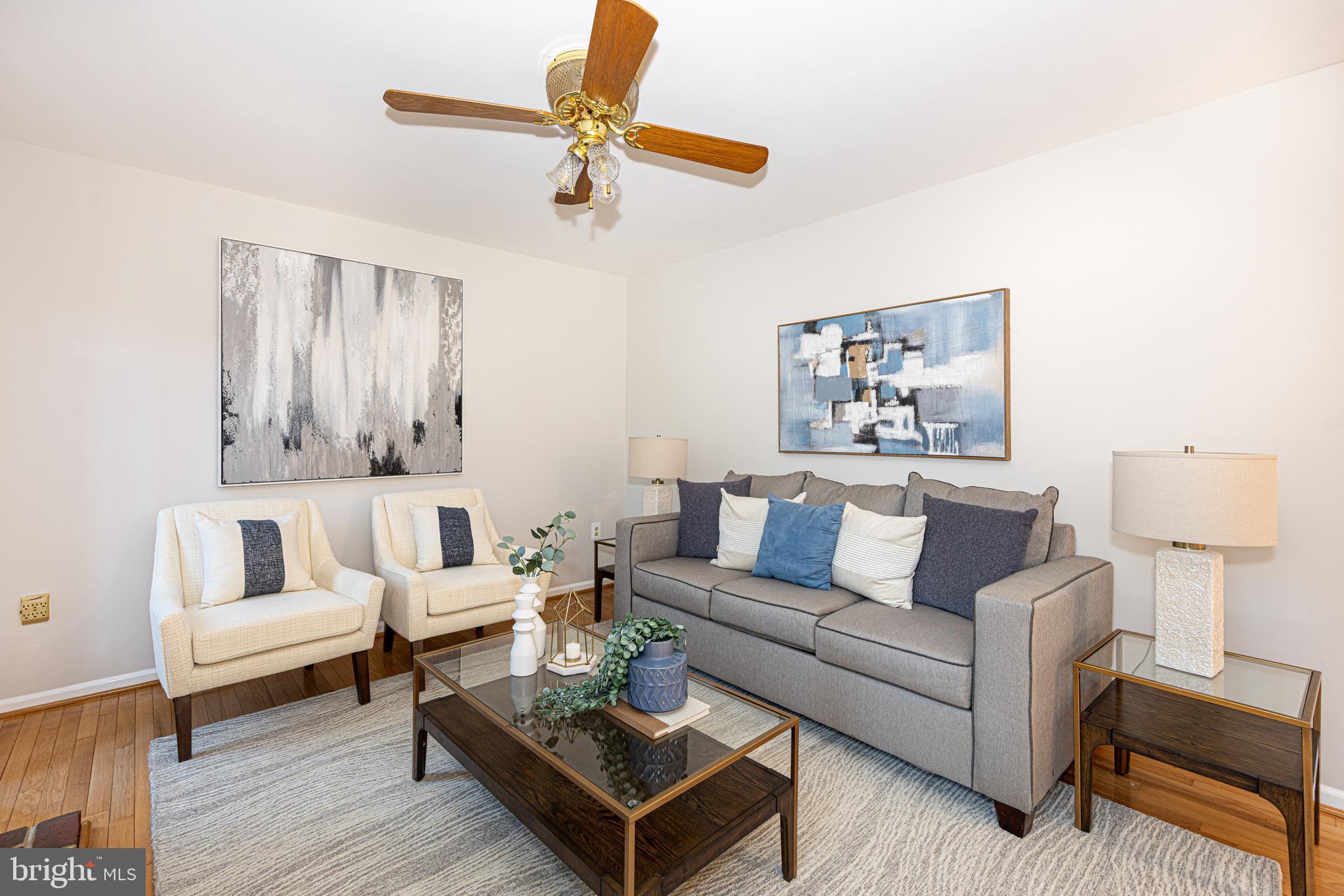 9596 Oakington Drive Fairfax Station, VA 22039 - Photo 14 of 52 a living room with furniture and a wooden floor