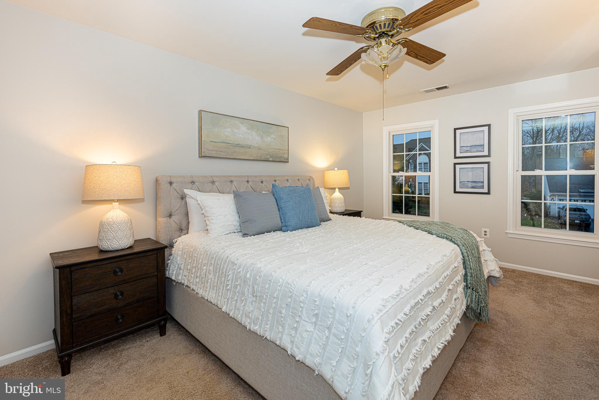 9596 Oakington Drive Fairfax Station, VA 22039 - Photo 26 of 52 a bedroom with a bed and window