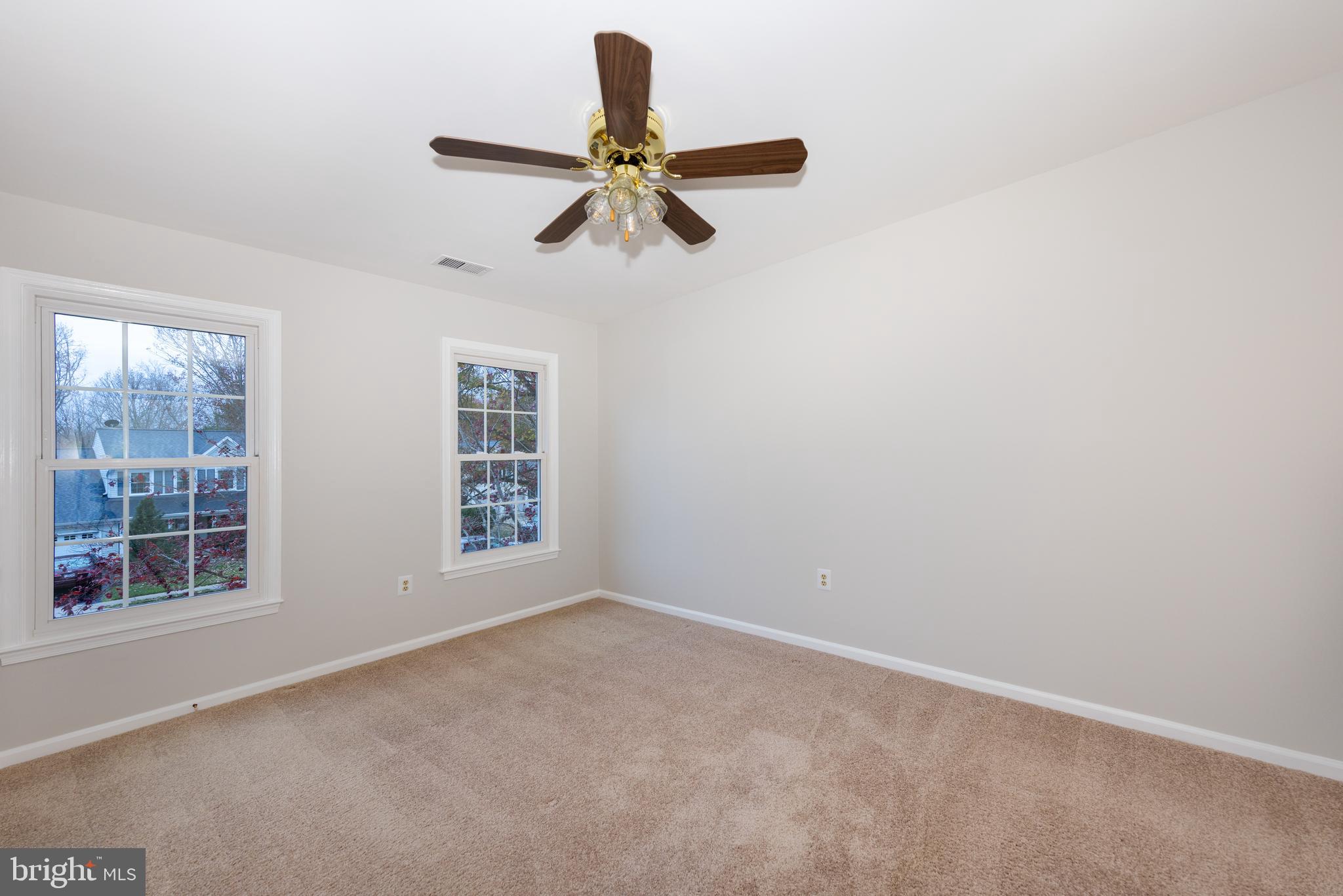 9596 Oakington Drive Fairfax Station, VA 22039 - Photo 27 of 52 a view of empty room with windows