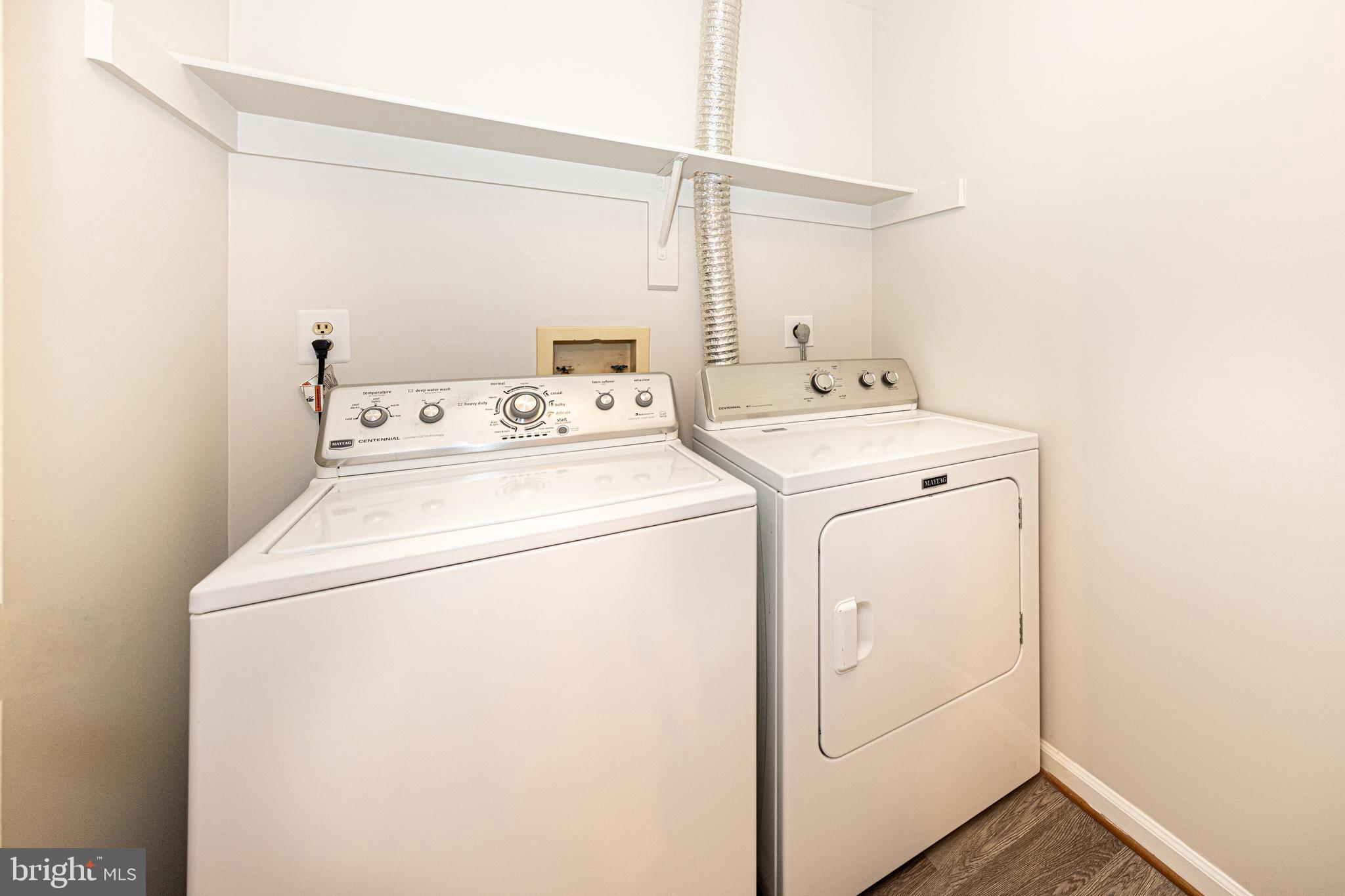 9596 Oakington Drive Fairfax Station, VA 22039 - Photo 28 of 52 a utility room with dryer and washer