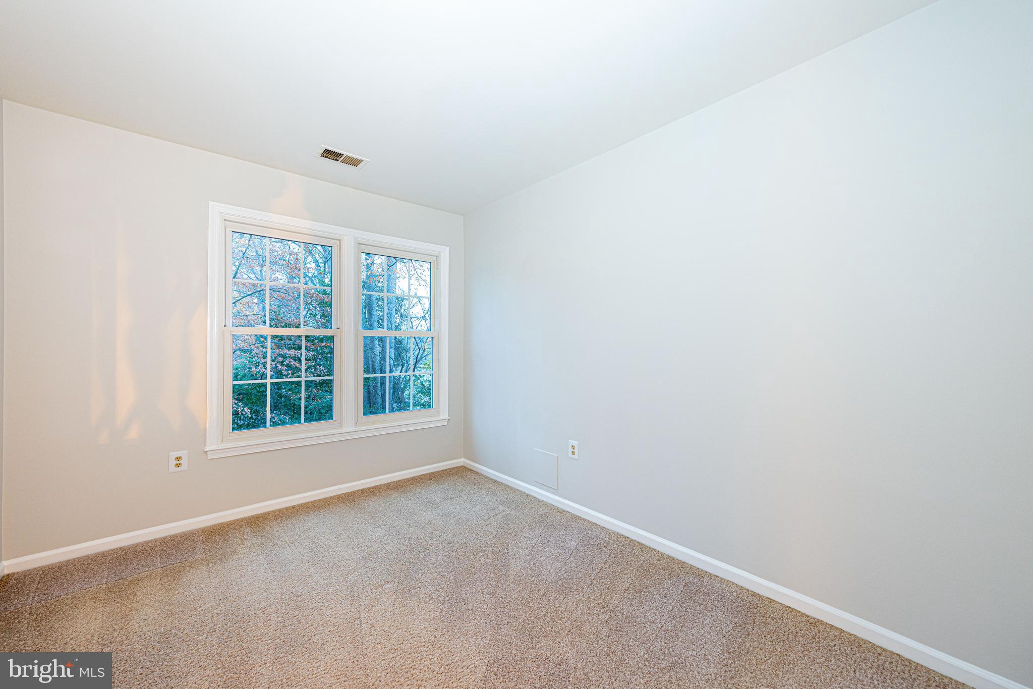 9596 Oakington Drive Fairfax Station, VA 22039 - Photo 30 of 52 an empty room with a window