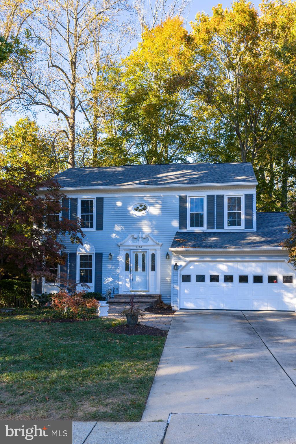 9596 Oakington Drive Fairfax Station, VA 22039 - Photo 42 of 52 a view of house with yard and green space