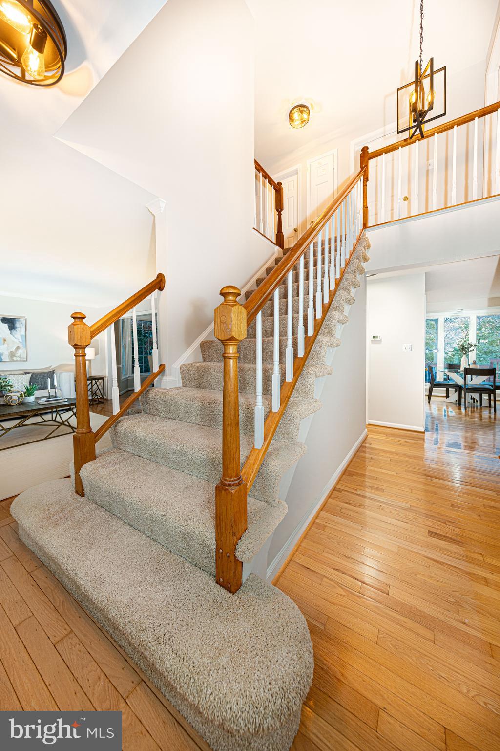 9596 Oakington Drive Fairfax Station, VA 22039 - Photo 7 of 52 a view of entryway and hall with wooden floor