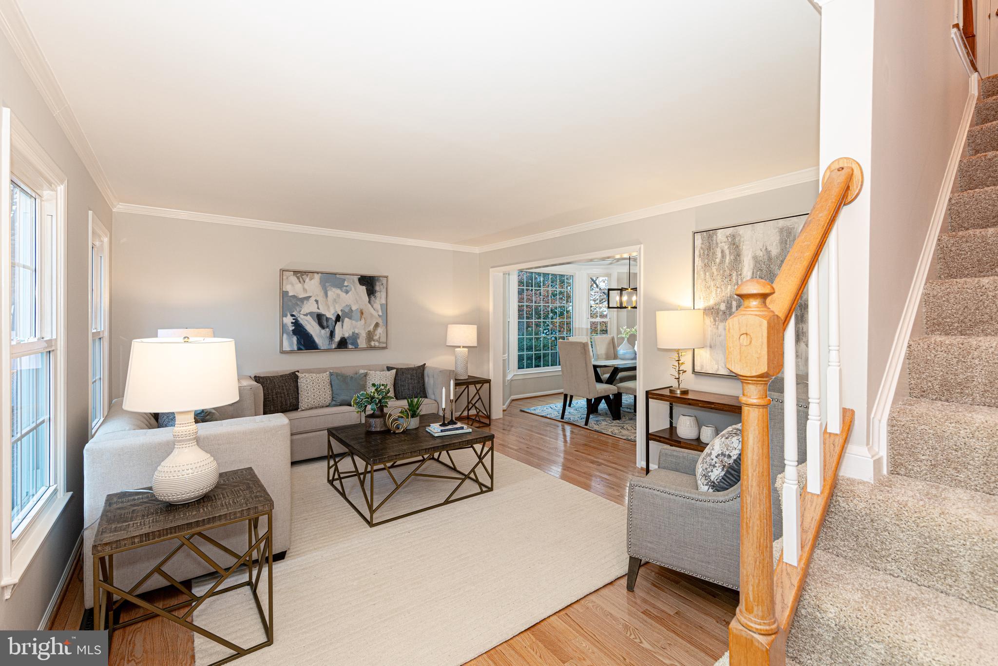 9596 Oakington Drive Fairfax Station, VA 22039 - Photo 8 of 52 a living room with furniture and a table