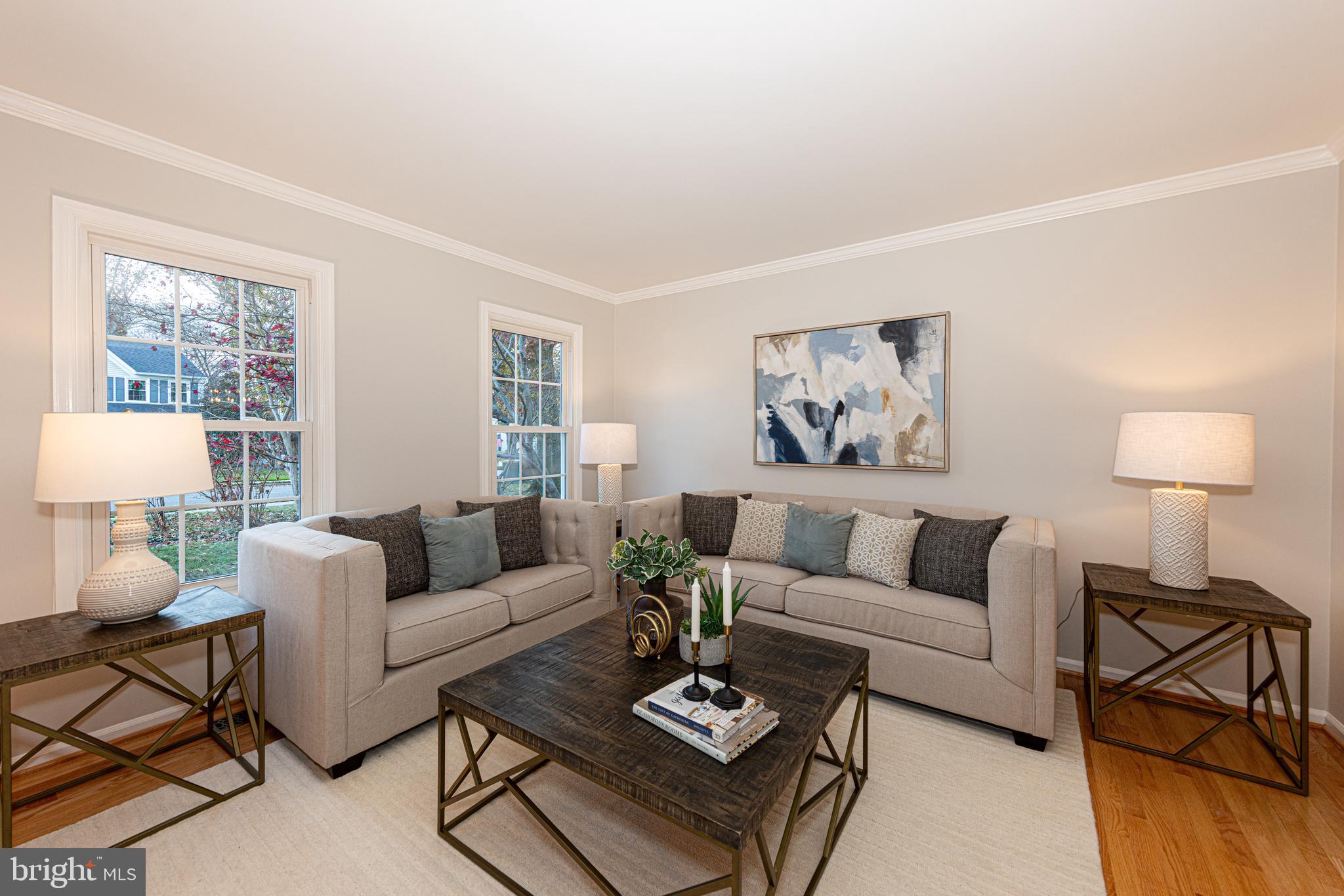 9596 Oakington Drive Fairfax Station, VA 22039 - Photo 9 of 52 a living room with furniture and a lamp