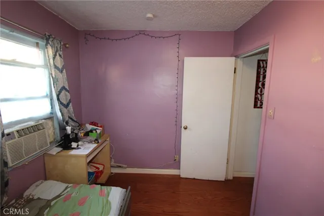 a room with furniture and a window