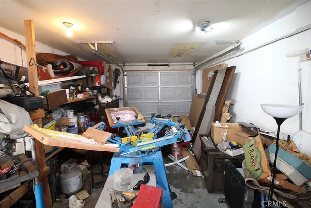 a utility room with lots of chairs and toys