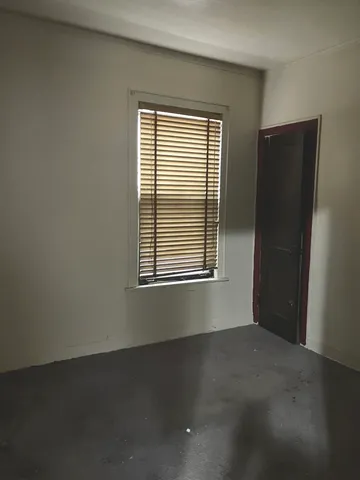 a view of a room with rack on the wall