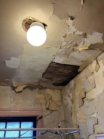 a view of a room with a wooden walls