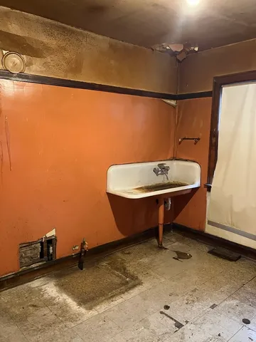 a view of a door and a window