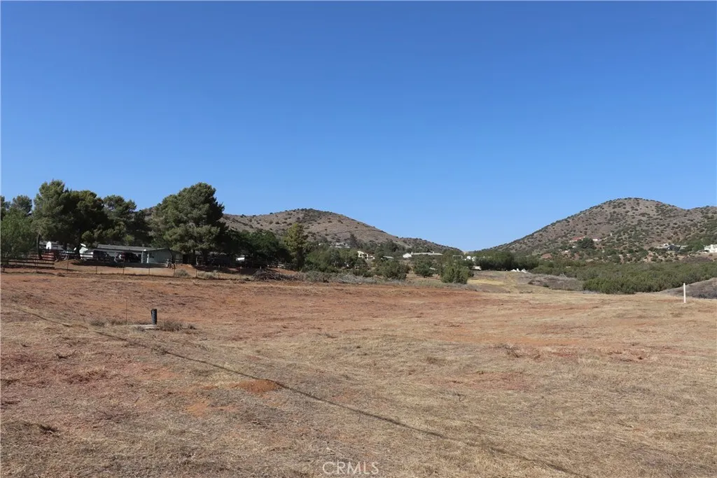 0 Hanawalt Road Santa Clarita, CA 91350 - Photo 3 of 18 a view of dirt field with mountain in background