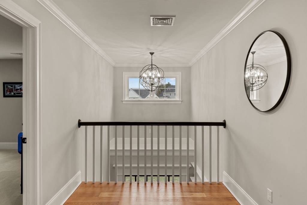45 Rochambeau Avenue Wrentham, MA 02093 - Photo 11 of 21 a view of a bedroom with furniture and a window