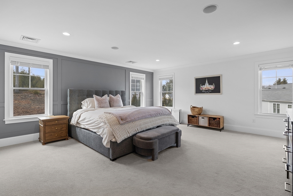 45 Rochambeau Avenue Wrentham, MA 02093 - Photo 12 of 21 a spacious bedroom with a bed and a couch