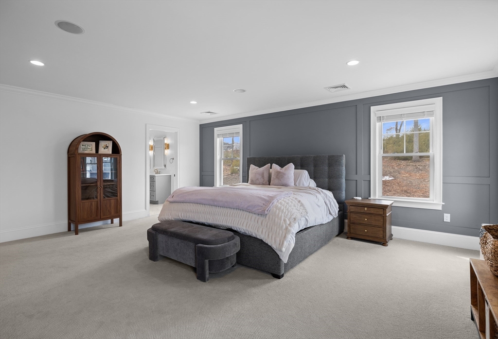 45 Rochambeau Avenue Wrentham, MA 02093 - Photo 13 of 21 a spacious bedroom with a bed and a large window