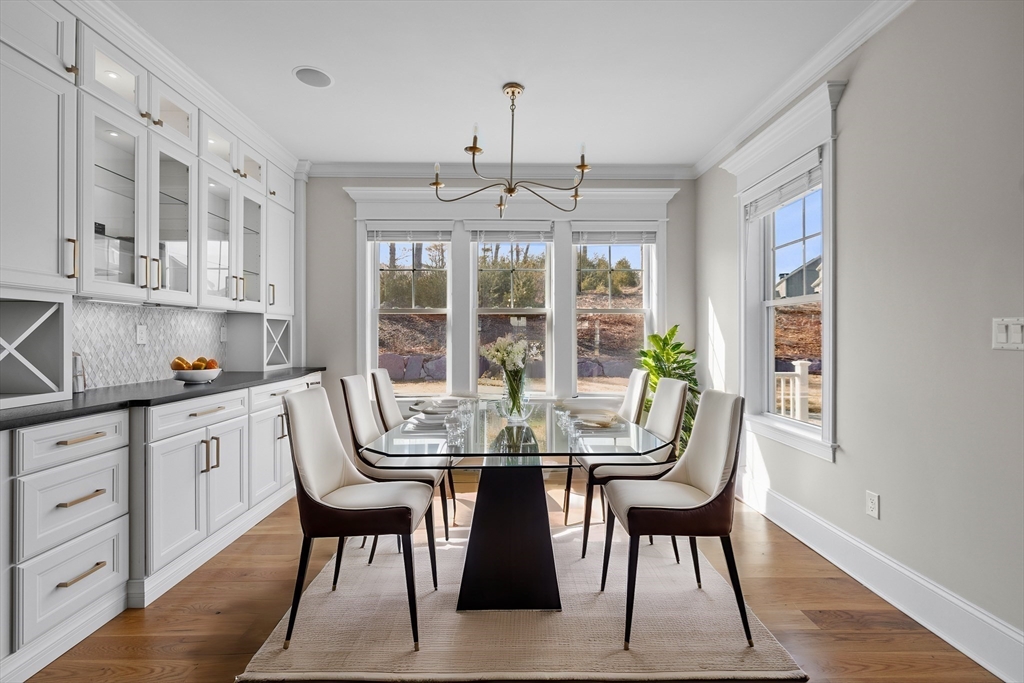 45 Rochambeau Avenue Wrentham, MA 02093 - Photo 3 of 21 a view of a dining room with furniture window and outside view