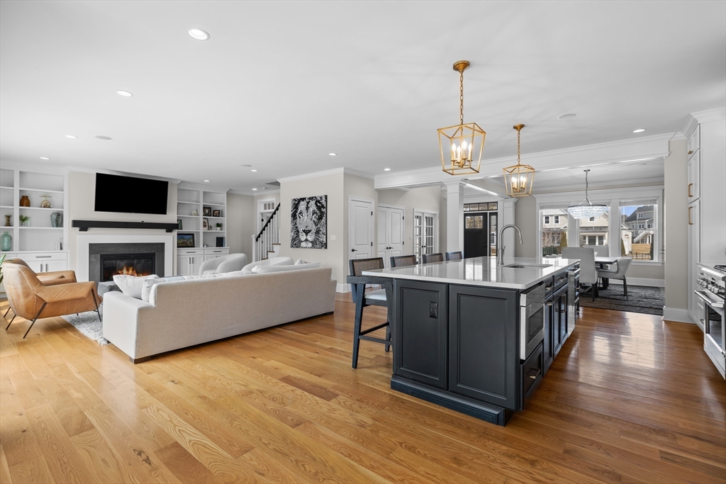 45 Rochambeau Avenue Wrentham, MA 02093 - Photo 6 of 21 a large living room with stainless steel appliances granite countertop a couch and a view of living room