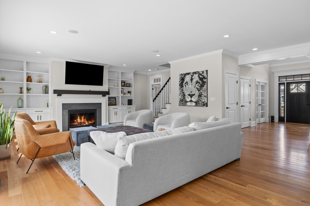 45 Rochambeau Avenue Wrentham, MA 02093 - Photo 9 of 21 a living room with furniture fireplace and flat screen tv
