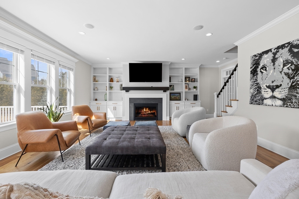 45 Rochambeau Avenue Wrentham, MA 02093 - Photo 10 of 21 a living room with furniture fireplace and flat screen tv