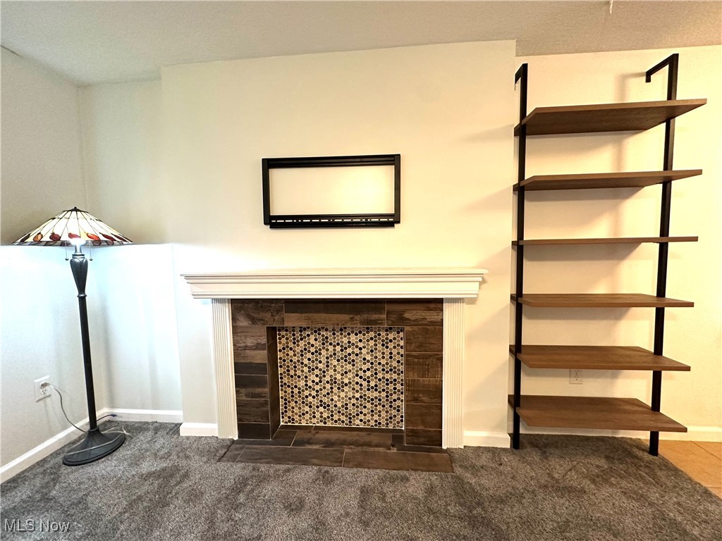 3727 Hopkins Road Youngstown, OH 44511 - Photo 23 of 40 Unfurnished living room with dark carpet