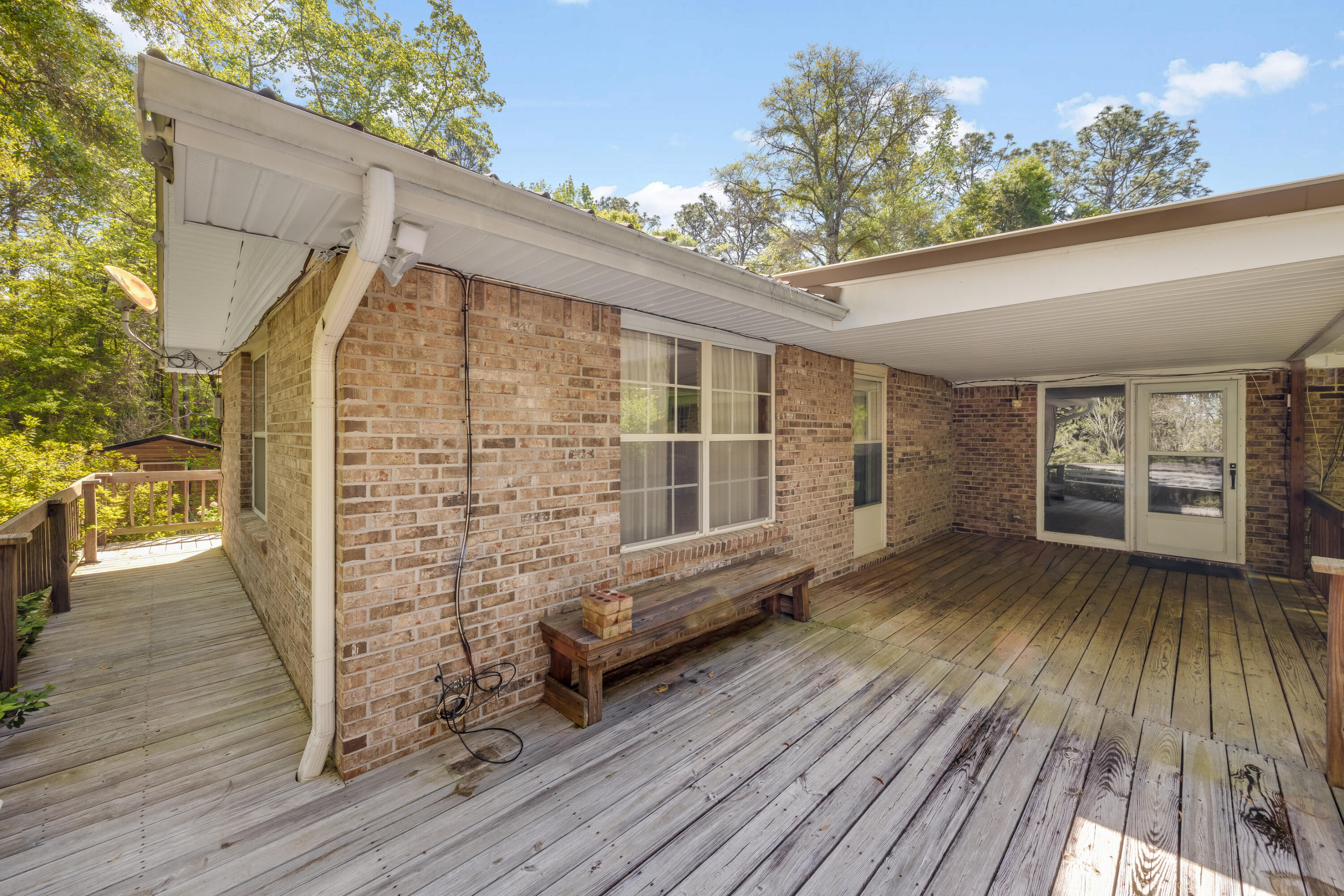 3607 Poverty Creek Road Crestview, FL 32539 - Photo 25 of 42 a view of outdoor space with wooden floor and outdoor space