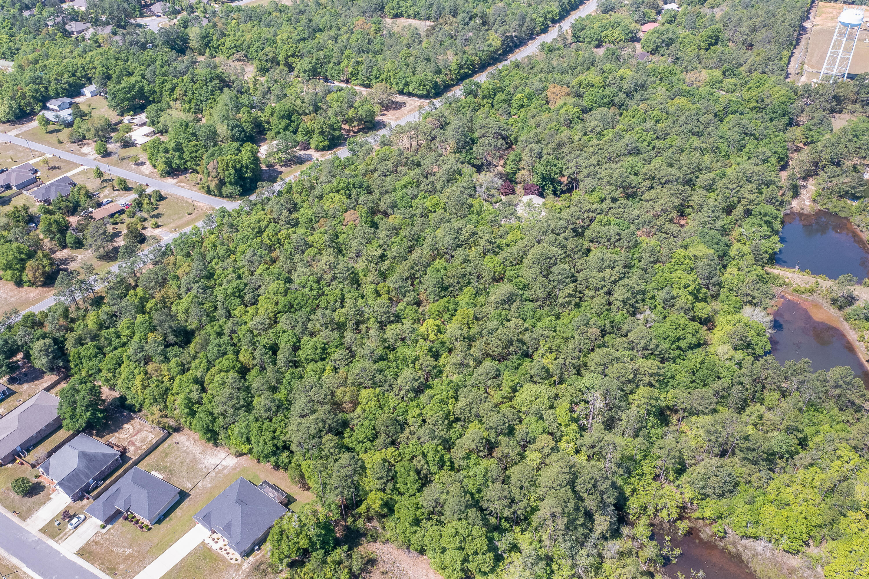 3607 Poverty Creek Road Crestview, FL 32539 - Photo 39 of 42 an aerial view of a house with a yard