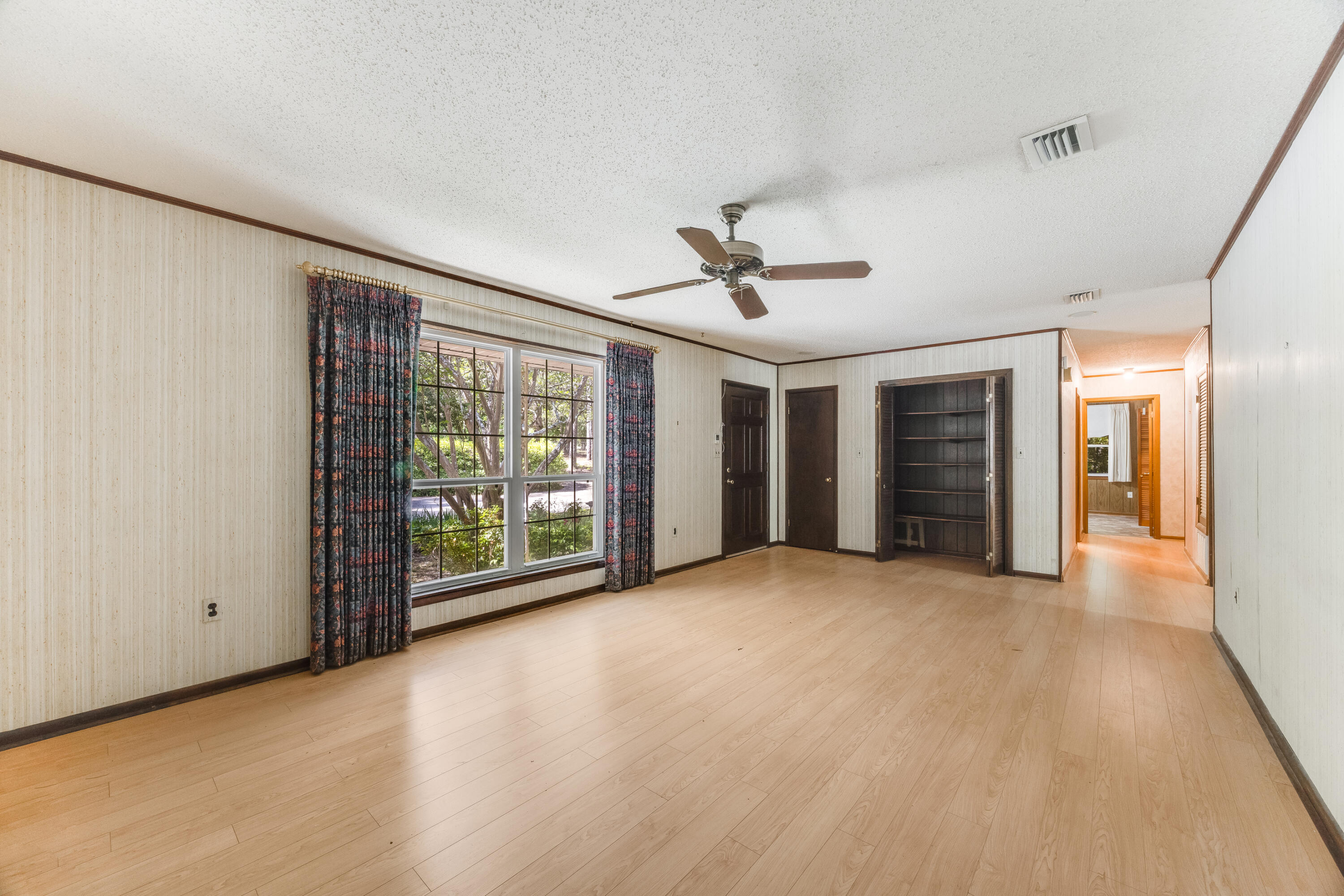 3607 Poverty Creek Road Crestview, FL 32539 - Photo 10 of 42 a view of an empty room with a window