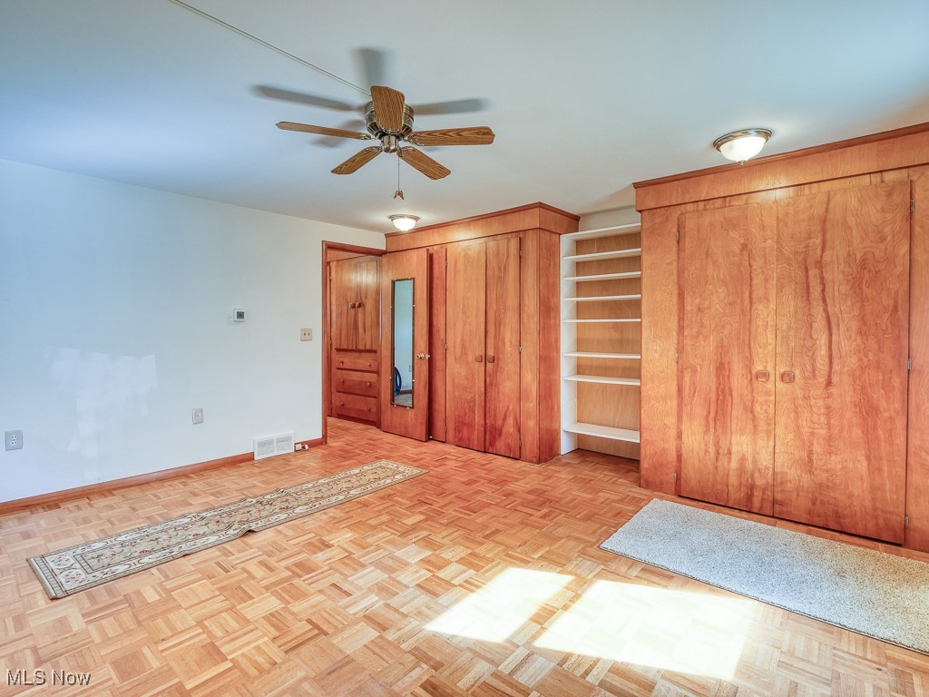 27133 Capel Road Columbia Station, OH 44028 - Photo 38 of 48 Unfurnished bedroom with baseboards, wood floor and ceiling fan
