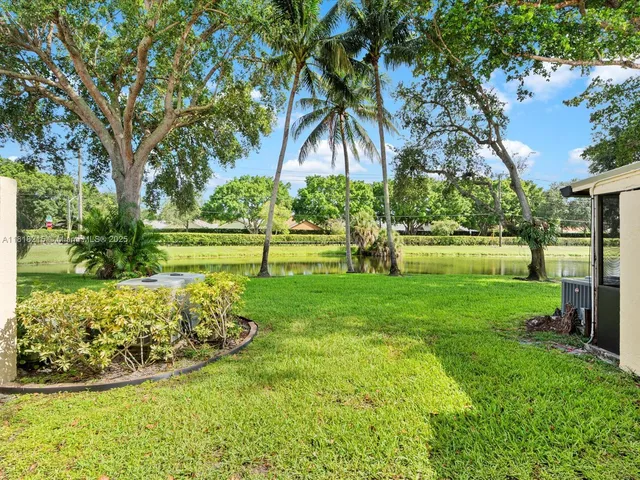 a view of a garden with a tree