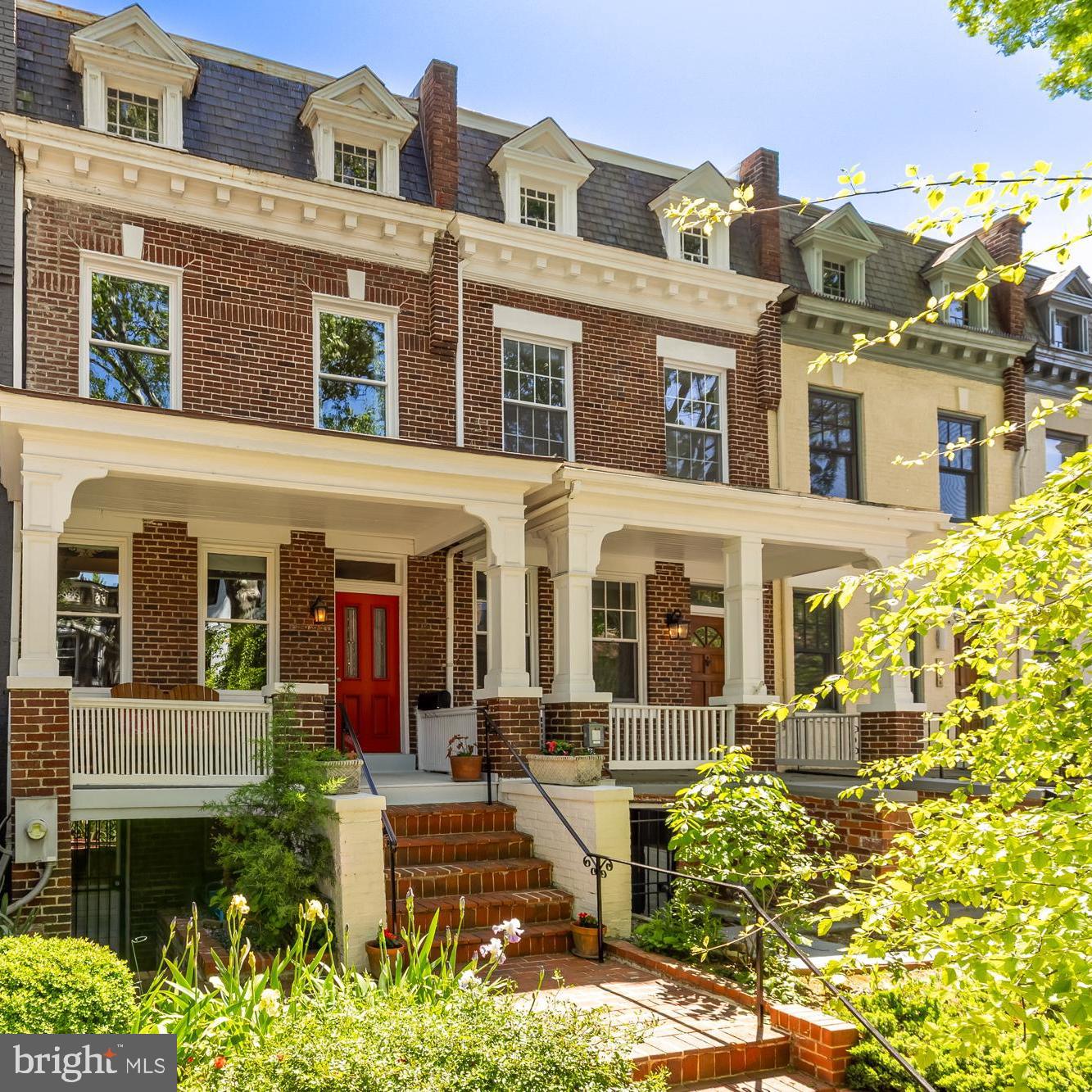 1716 Euclid Street Northwest Washington, DC 20009 - Photo 1 of 54 a front view of a multi story residential apartment building