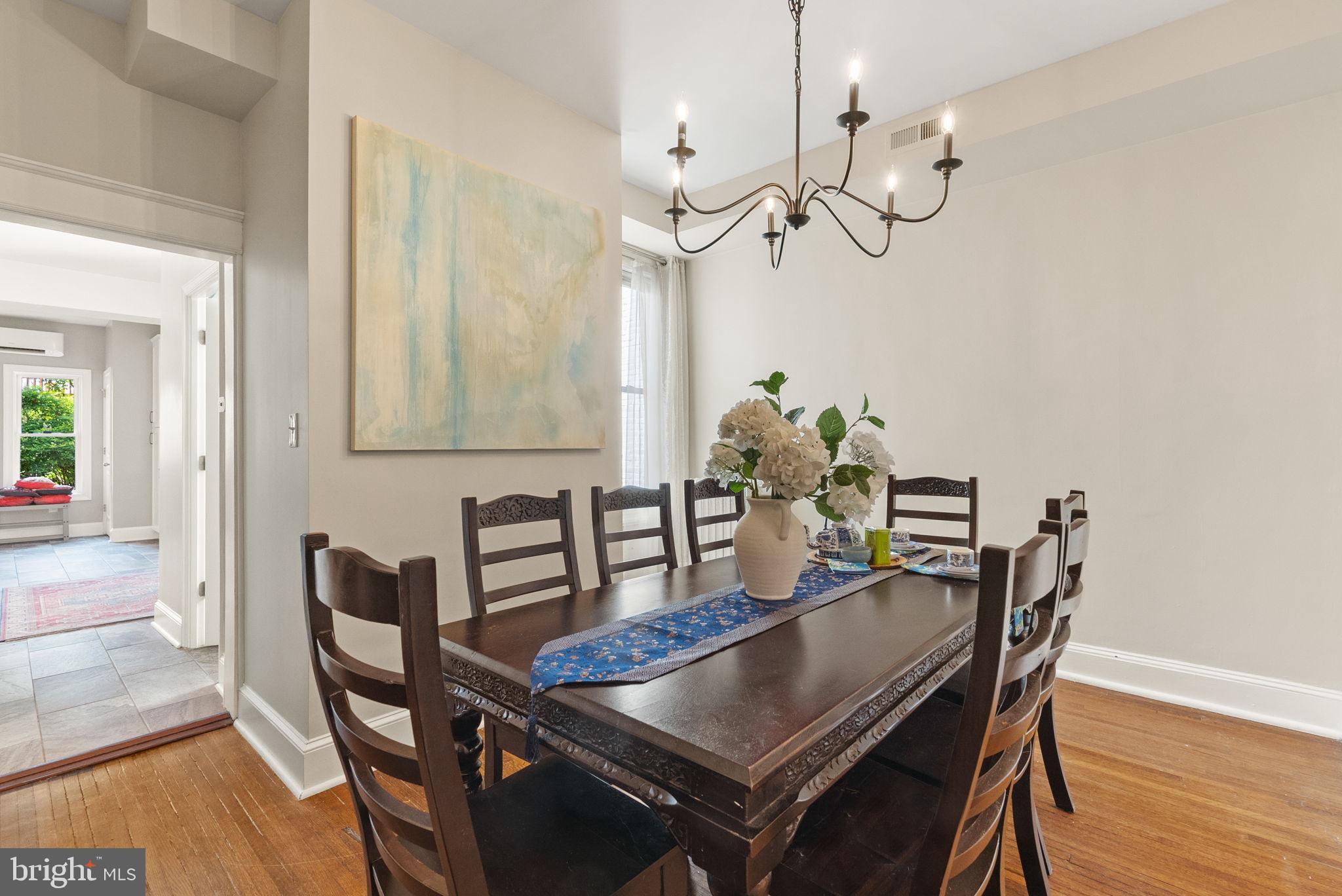 1716 Euclid Street Northwest Washington, DC 20009 - Photo 12 of 54 a dining room with furniture and wooden floor