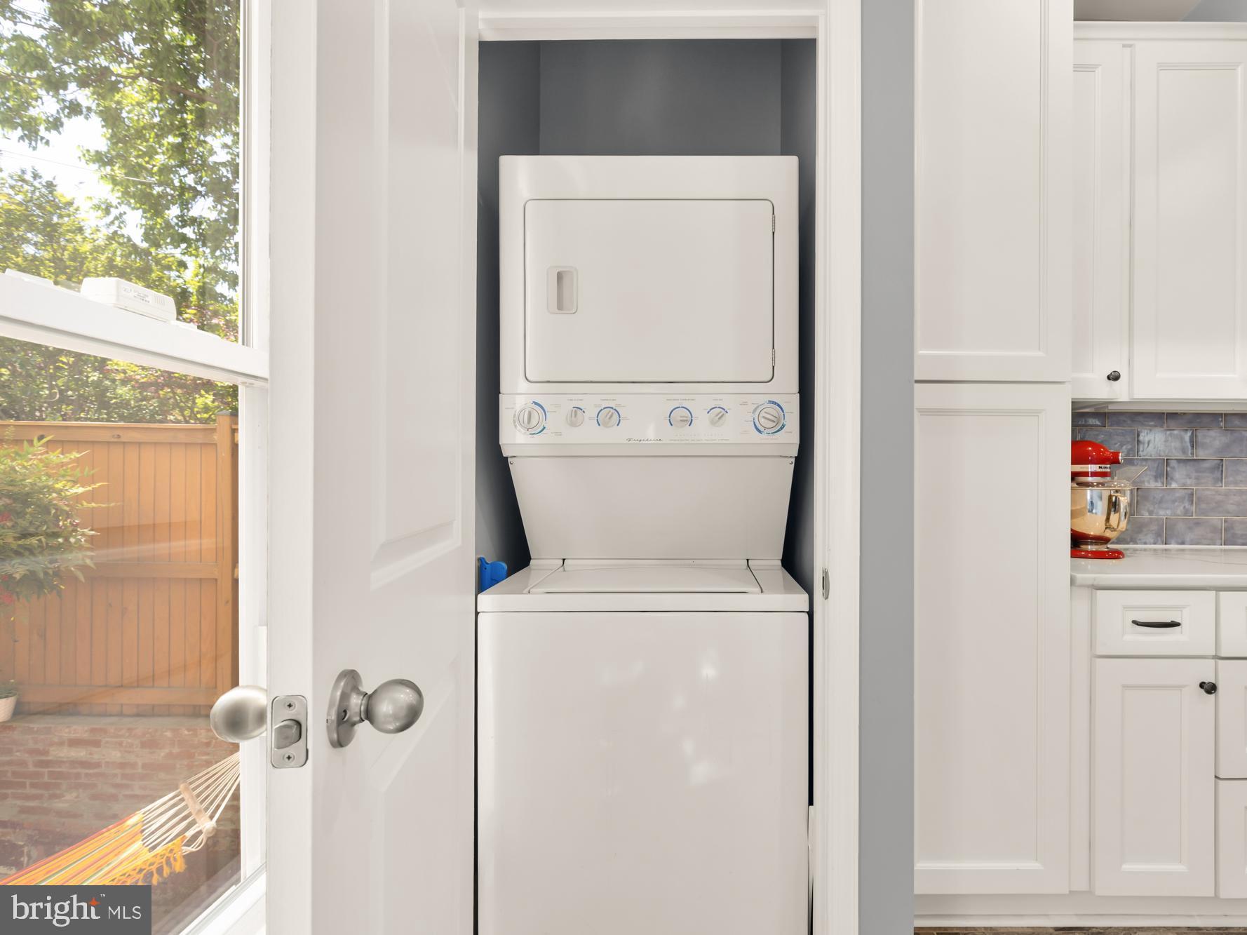 1716 Euclid Street Northwest Washington, DC 20009 - Photo 19 of 54 a close view of a utility room with dryer and washer