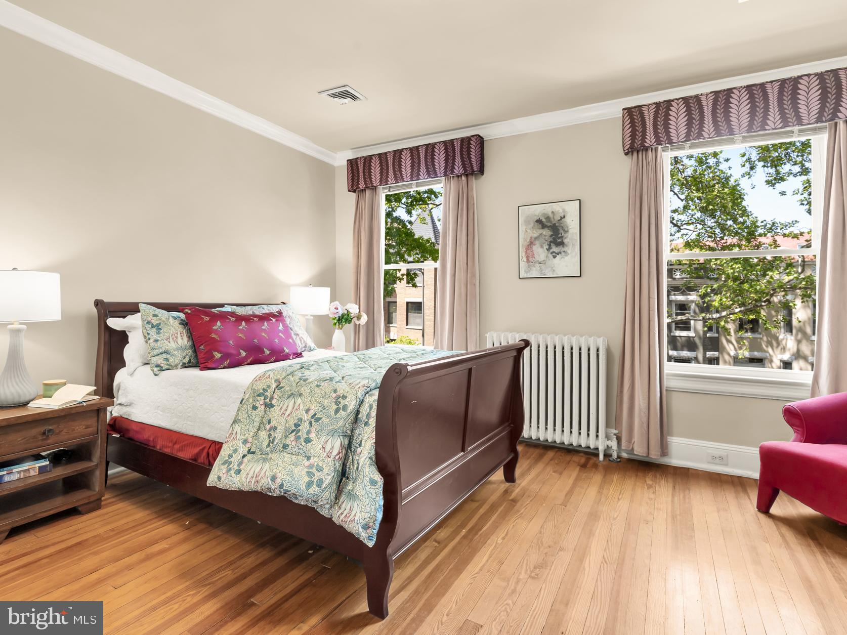 1716 Euclid Street Northwest Washington, DC 20009 - Photo 23 of 54 a bedroom with a bed and a window with outer view
