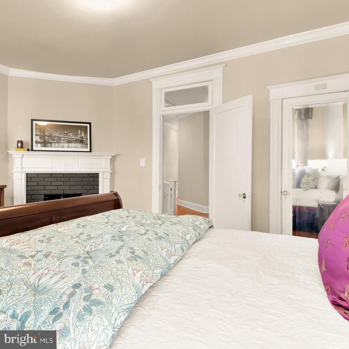 1716 Euclid Street Northwest Washington, DC 20009 - Photo 24 of 54 a bedroom with a bed and a dresser