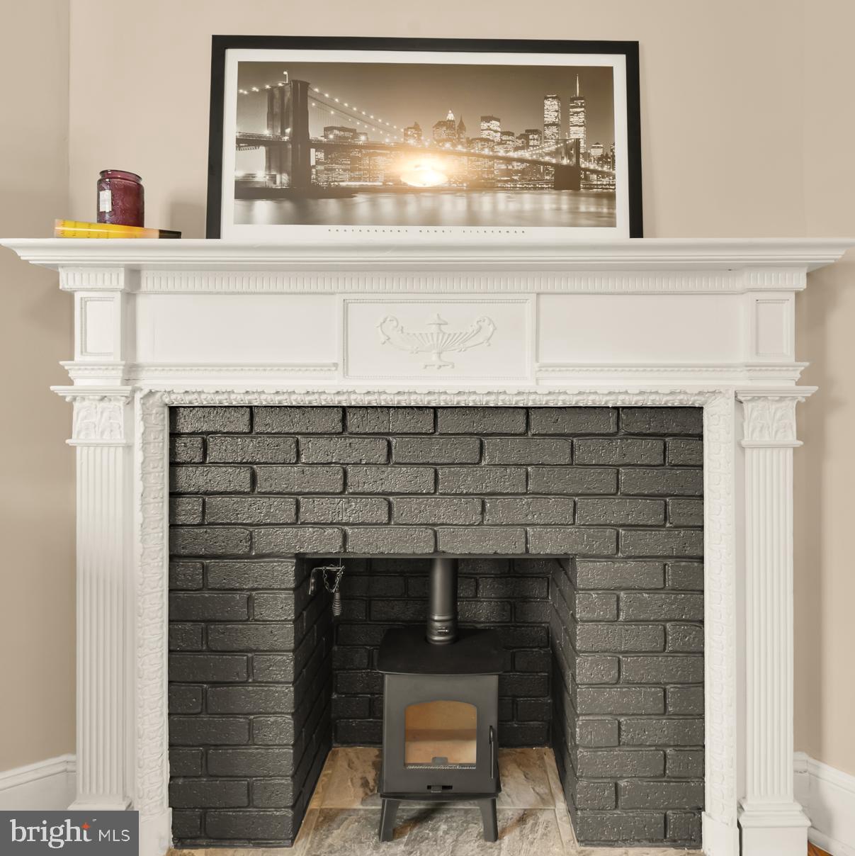 1716 Euclid Street Northwest Washington, DC 20009 - Photo 25 of 54 Wood Burning Stove in Primary Bedroom