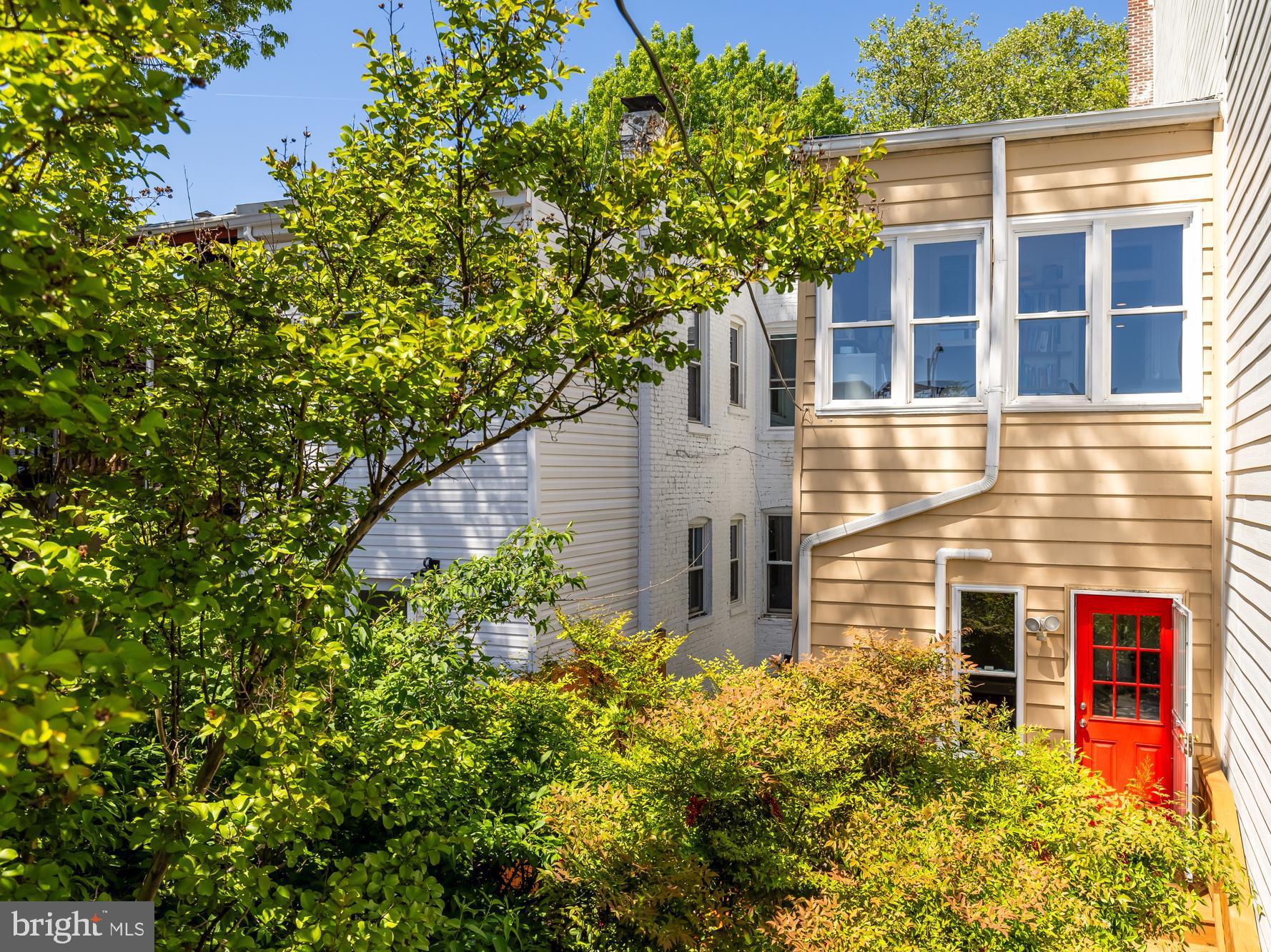 1716 Euclid Street Northwest Washington, DC 20009 - Photo 42 of 54 a backyard of a house with lots of green space
