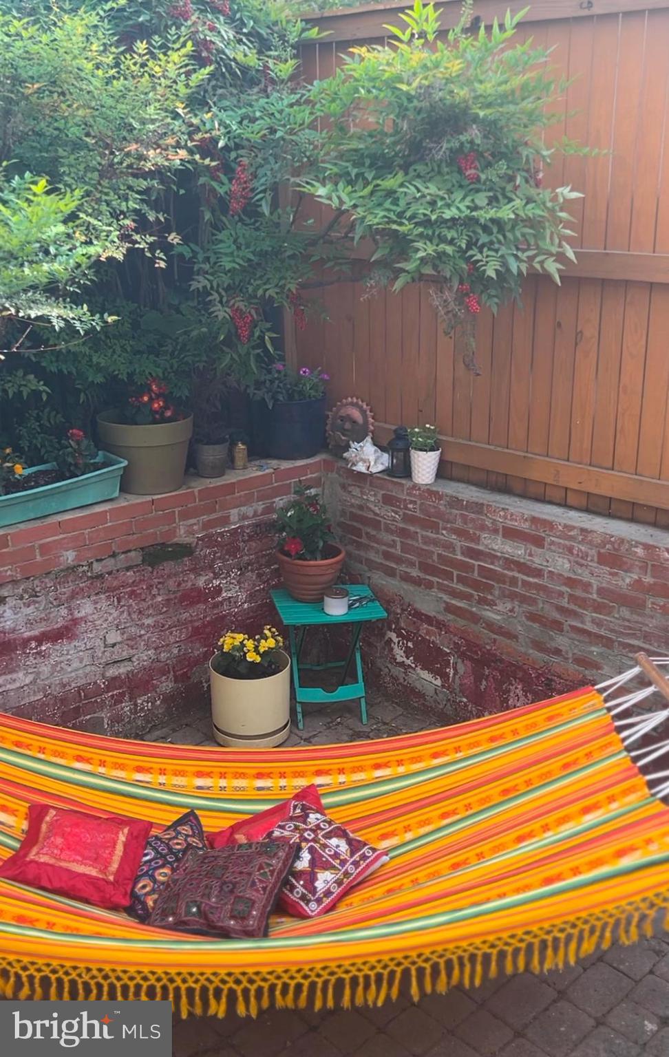 1716 Euclid Street Northwest Washington, DC 20009 - Photo 46 of 54 a view of swimming pool with a lounge chair and potted plants