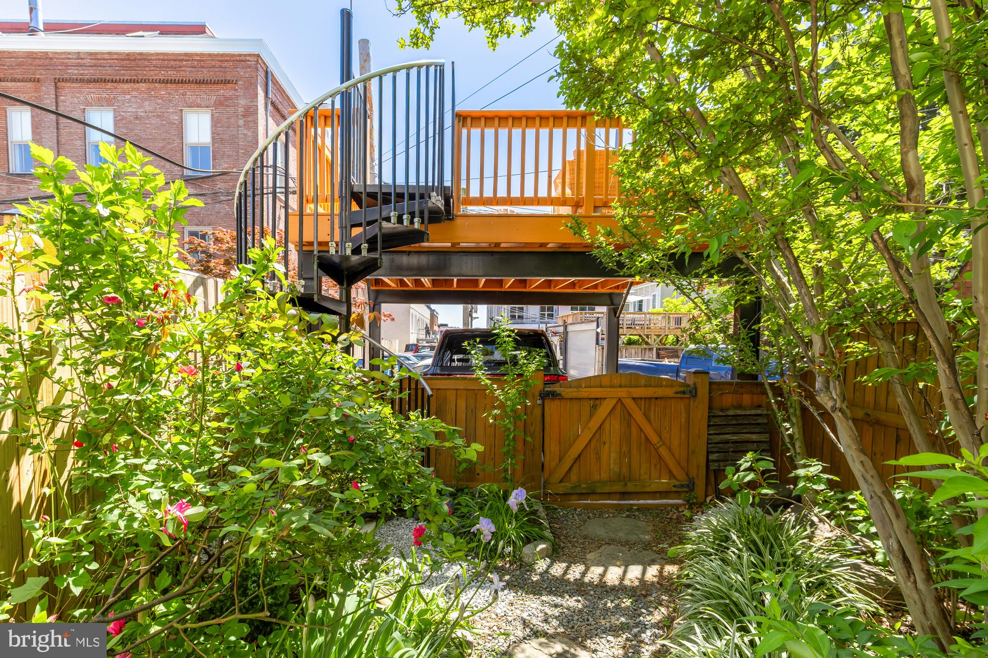 1716 Euclid Street Northwest Washington, DC 20009 - Photo 47 of 54 a view of a patio with table and chairs and potted plants