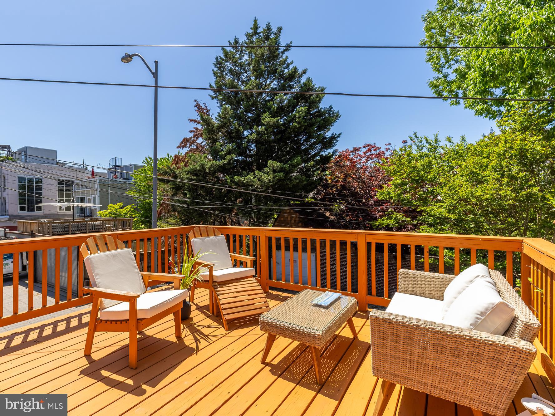 1716 Euclid Street Northwest Washington, DC 20009 - Photo 51 of 54 a view of balcony with wooden floor and outdoor seating
