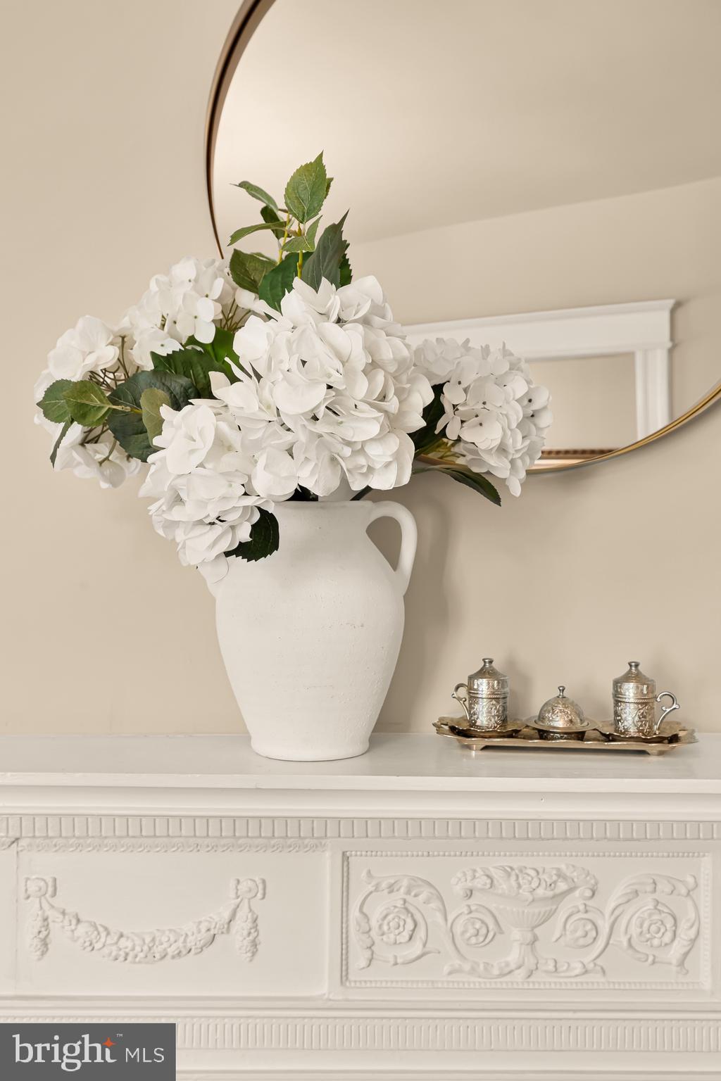 1716 Euclid Street Northwest Washington, DC 20009 - Photo 9 of 54 a vase of flowers sitting on a table
