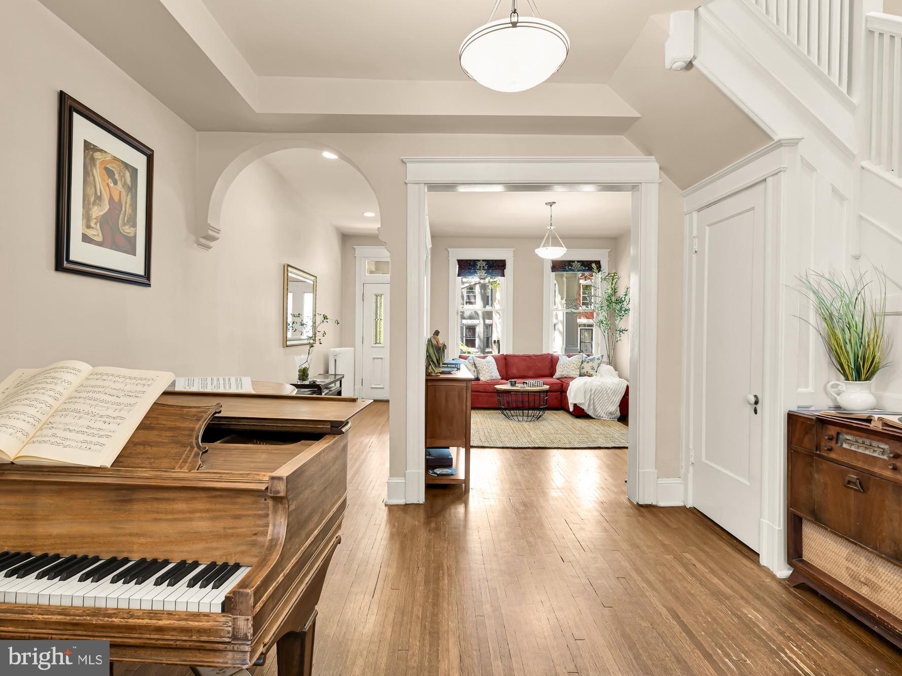 1716 Euclid Street Northwest Washington, DC 20009 - Photo 10 of 54 a living room with furniture and a wooden floor