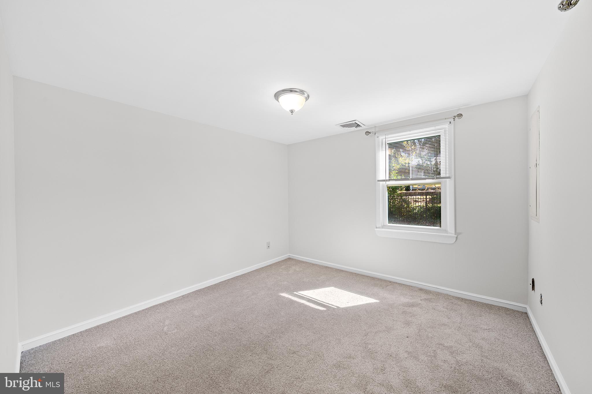1203 Wedgewood Road Flourtown, PA 19031 - Photo 15 of 25 an empty room with windows