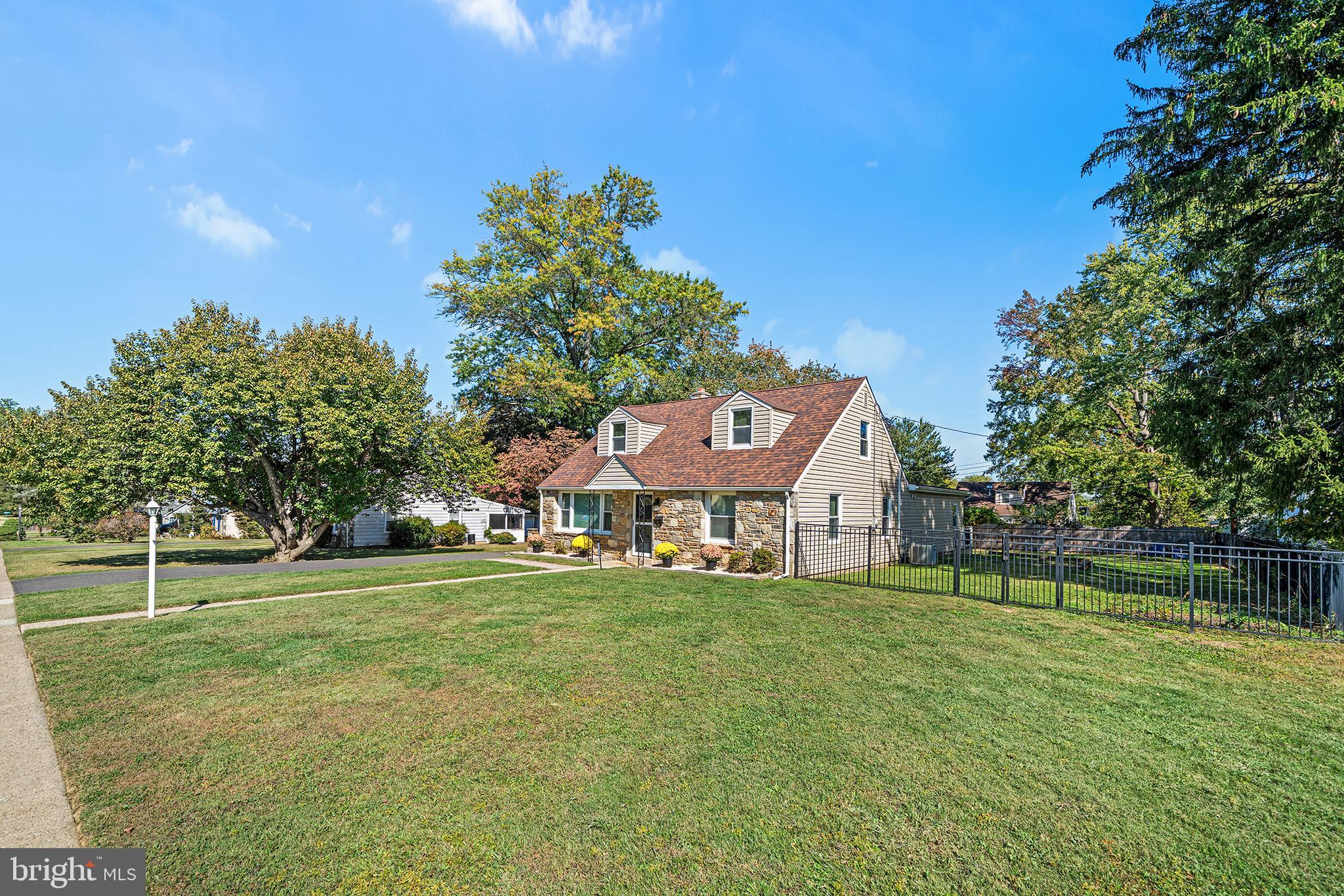 1203 Wedgewood Road Flourtown, PA 19031 - Photo 25 of 25 a front view of a house with a yard