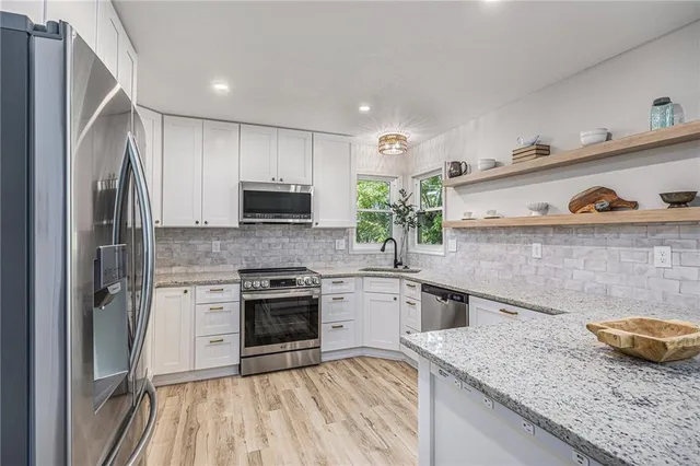 $525,000 | 1345 Northeast Foxwood Drive, Lee's Summit, MO 64086