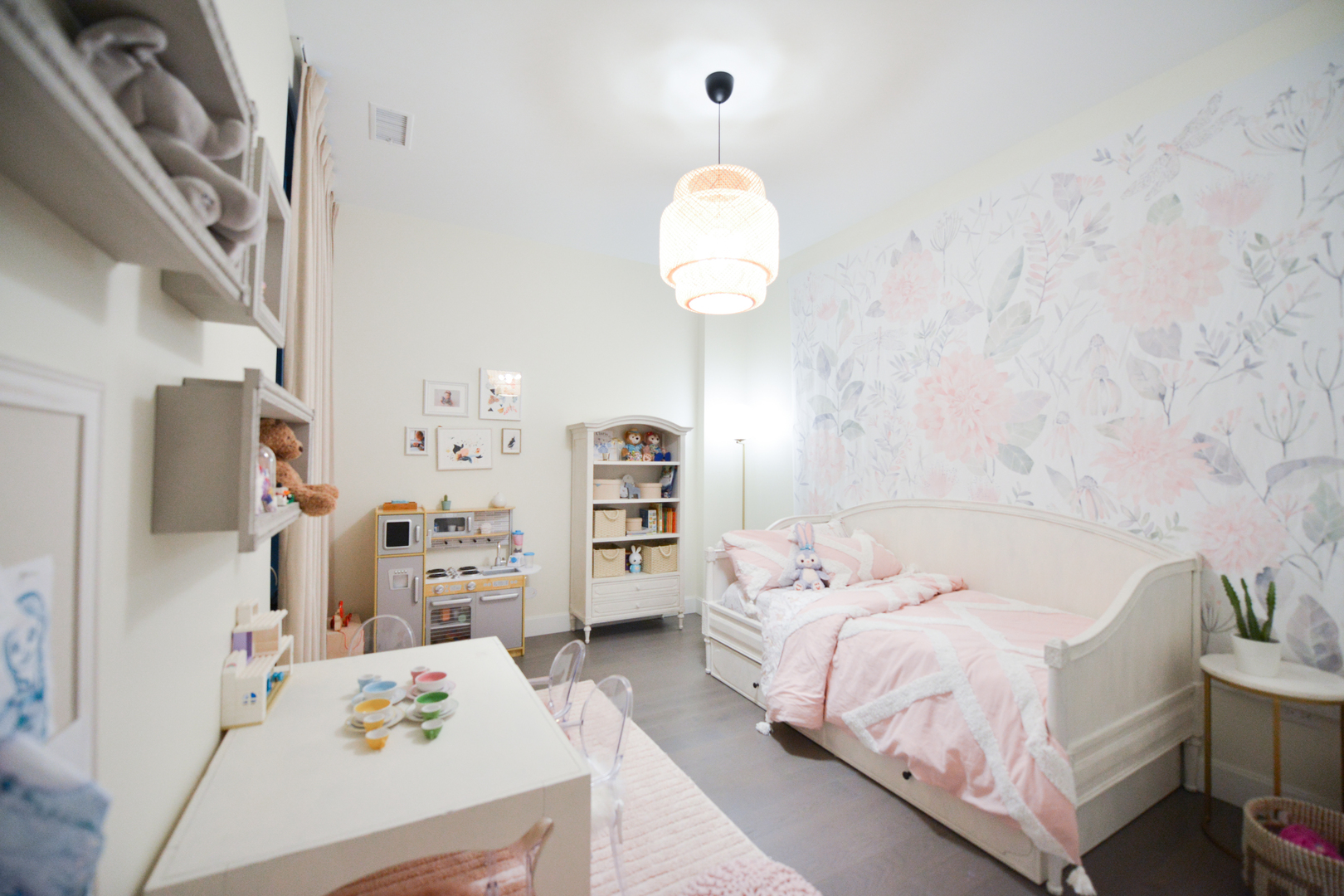 28 North Carpenter Street, Unit 2N Chicago, IL 60607 - Photo 13 of 30 a bedroom with a bed and a chandelier